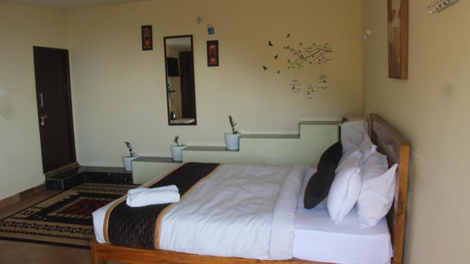 Kollanoor Guest House Мадікері Номер фото